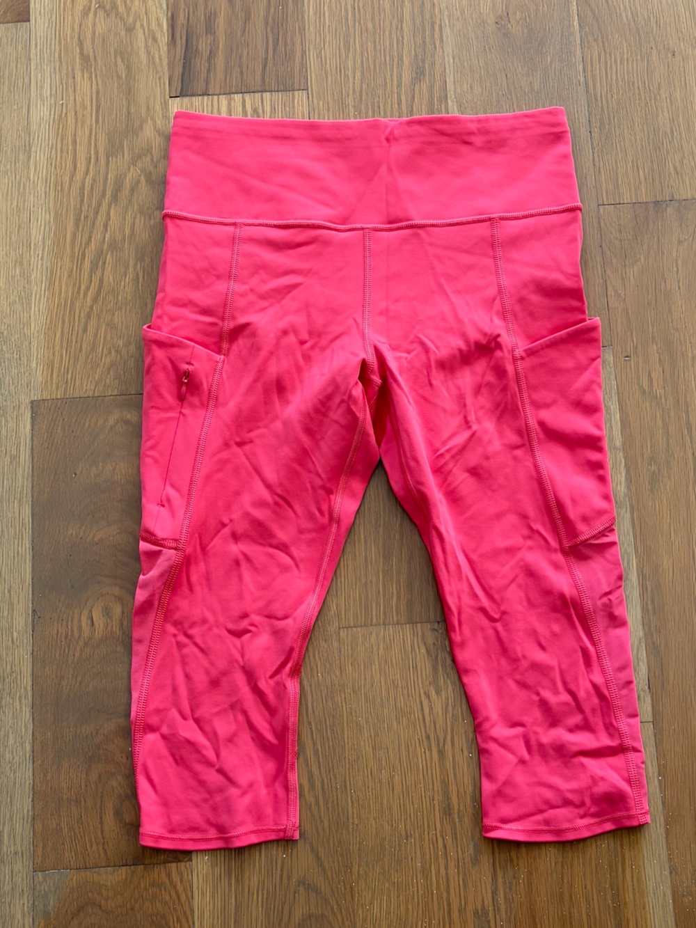 Athleta Bright Pink Cropped Performance Leggings with Side Pockets